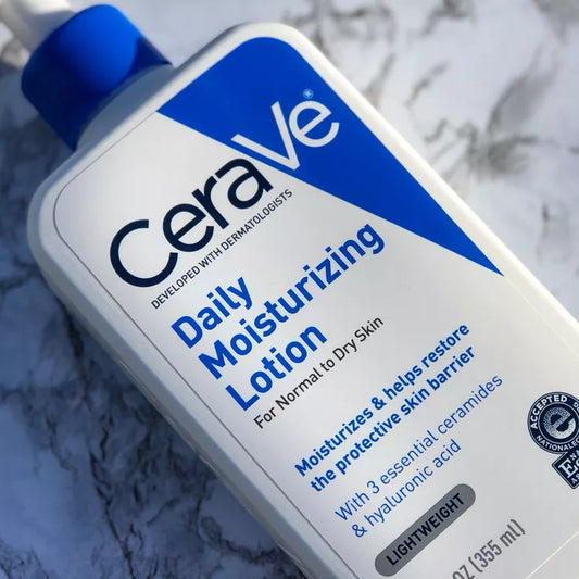 CeraVe Daily Moisturizing Lotion bottle on white towel for gentle hydration